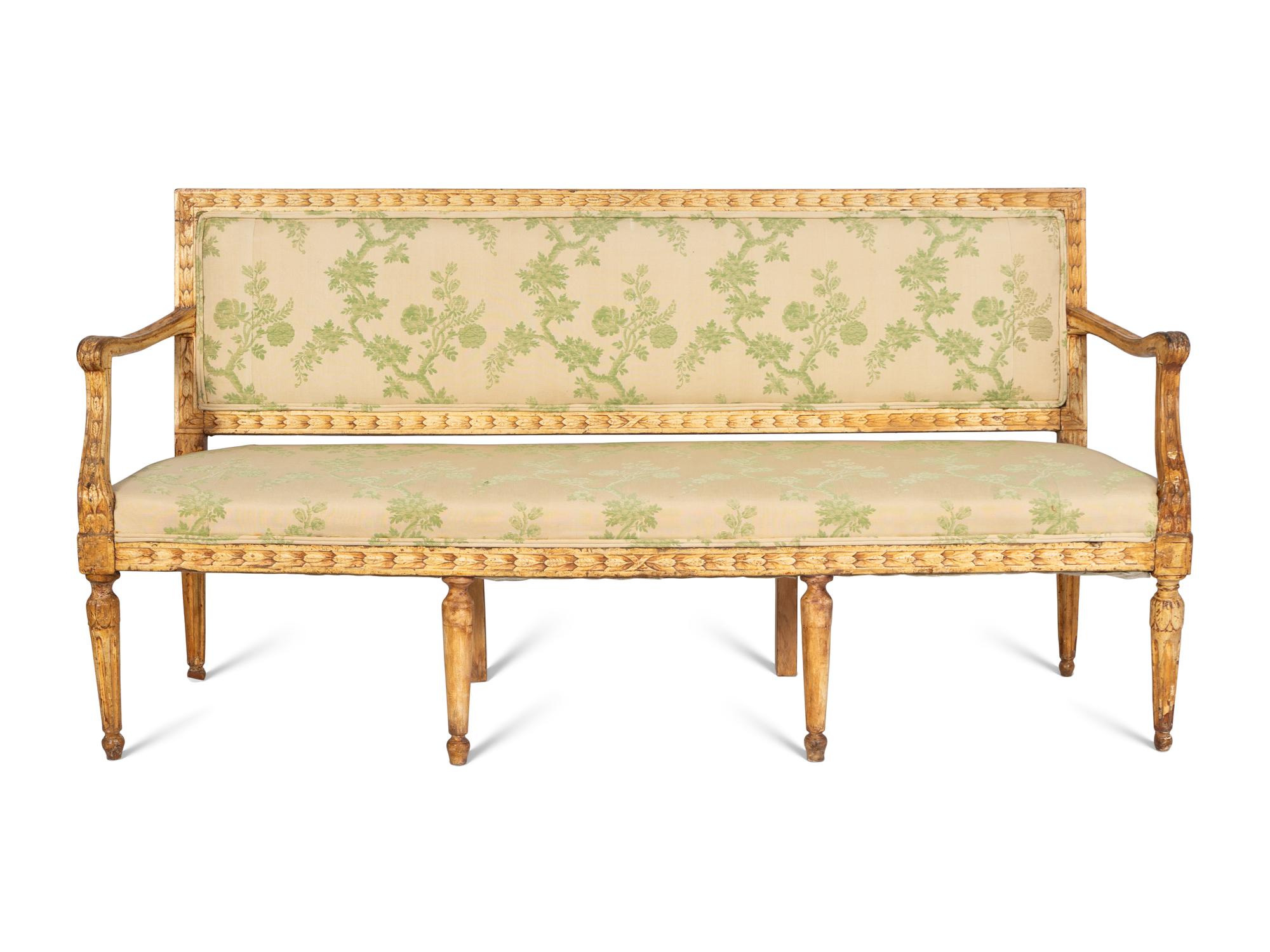 A Near Pair of Italian Neoclassical Cream-Painted Sofas