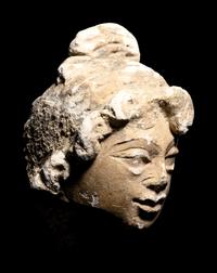 Three Gandharan Fragmentary Stucco Heads and One European Fragmentary Stucco Head
