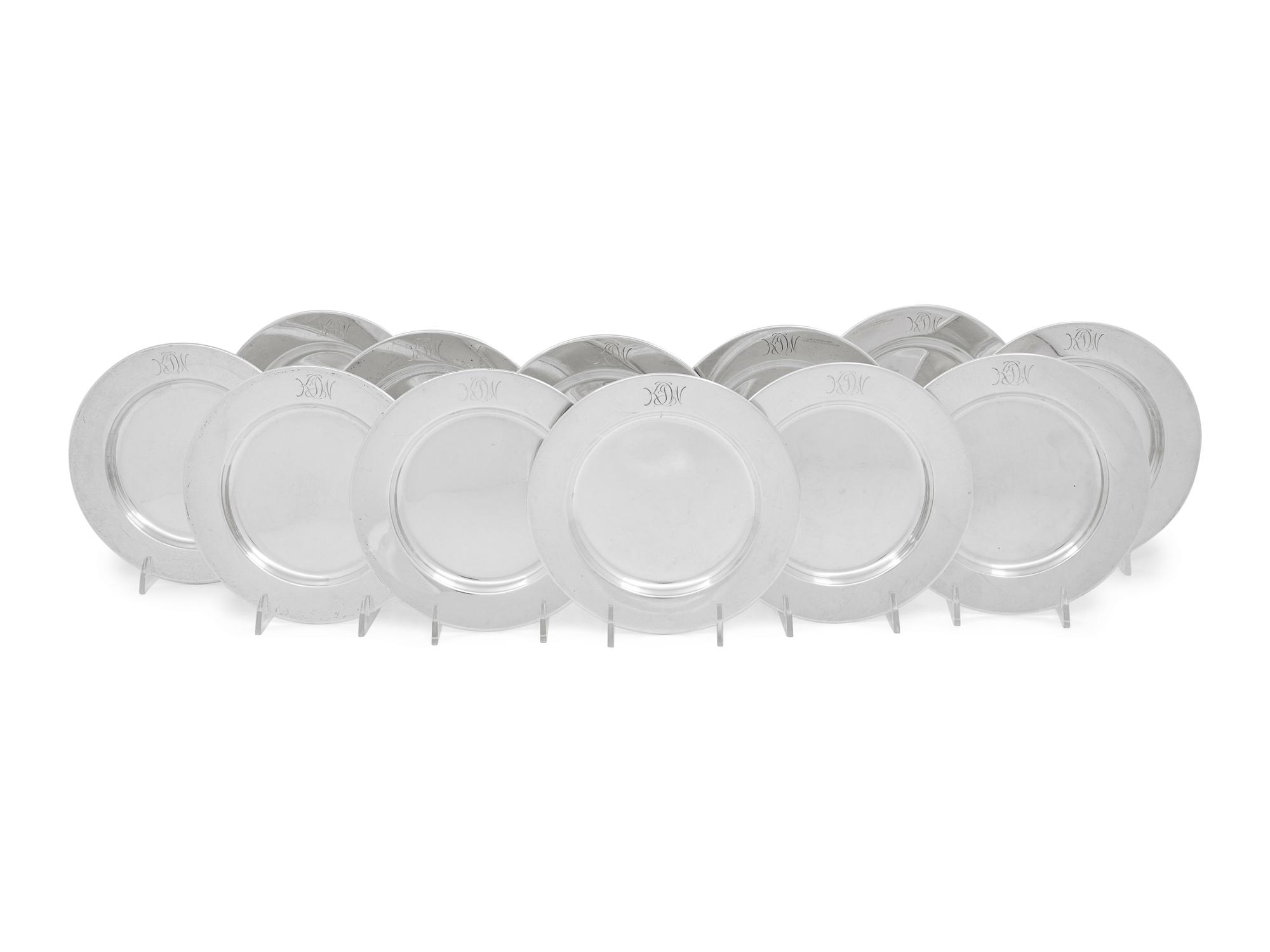 A Set of Twelve American Silver Bread Plates