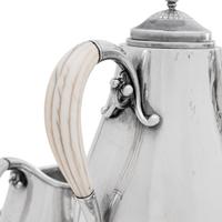 A Georg Jensen Cosmos Seven-Piece Silver Tea and Coffee Service
