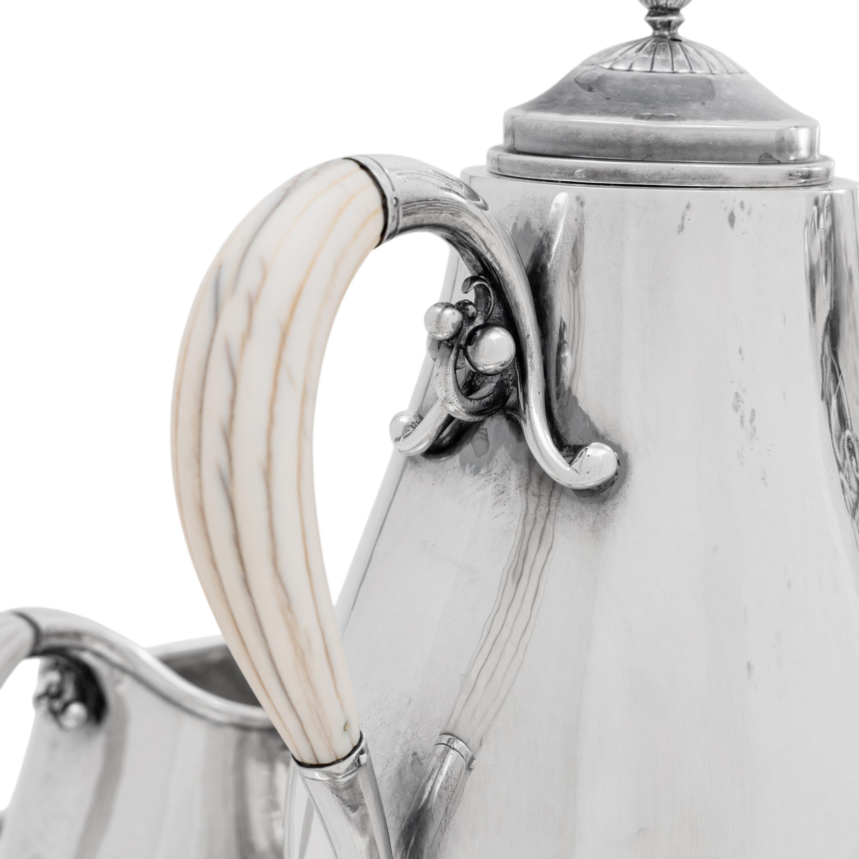 A Georg Jensen Cosmos Seven-Piece Silver Tea and Coffee Service