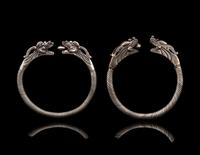 A Pair of Chinese Silver 'Dragon' Bangles