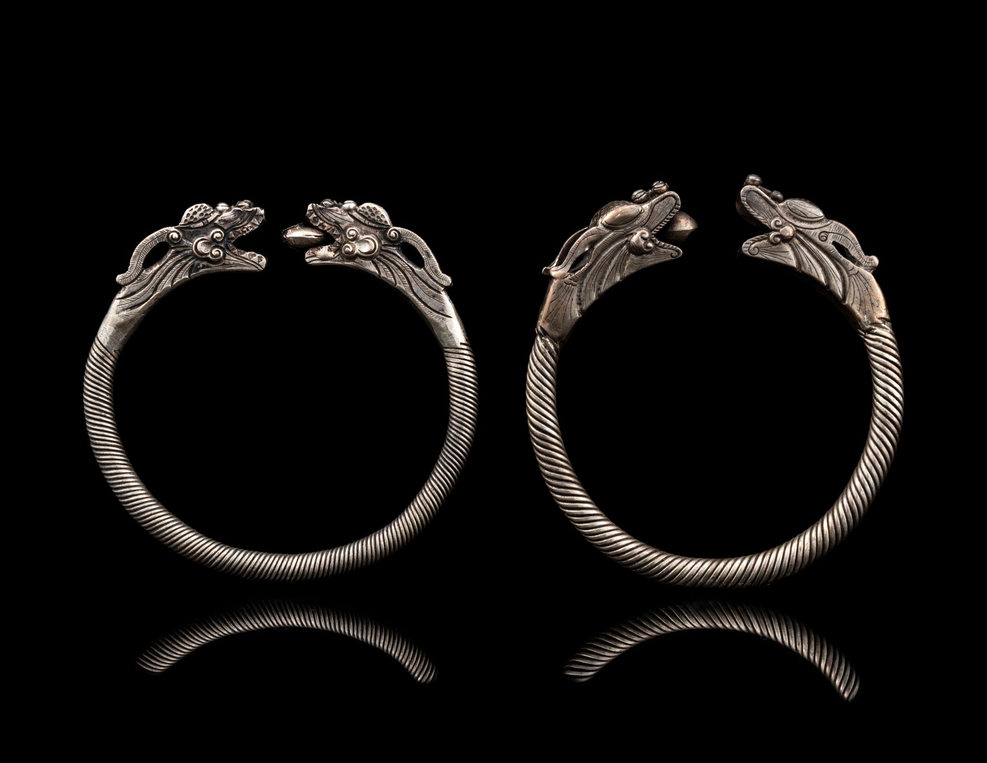 A Pair of Chinese Silver 'Dragon' Bangles