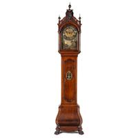 A Dutch Walnut and Gilt Metal Mounted Tall Case Clock