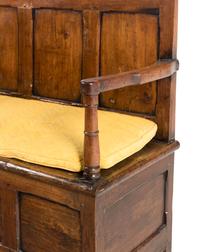 An English Carved Oak Settle