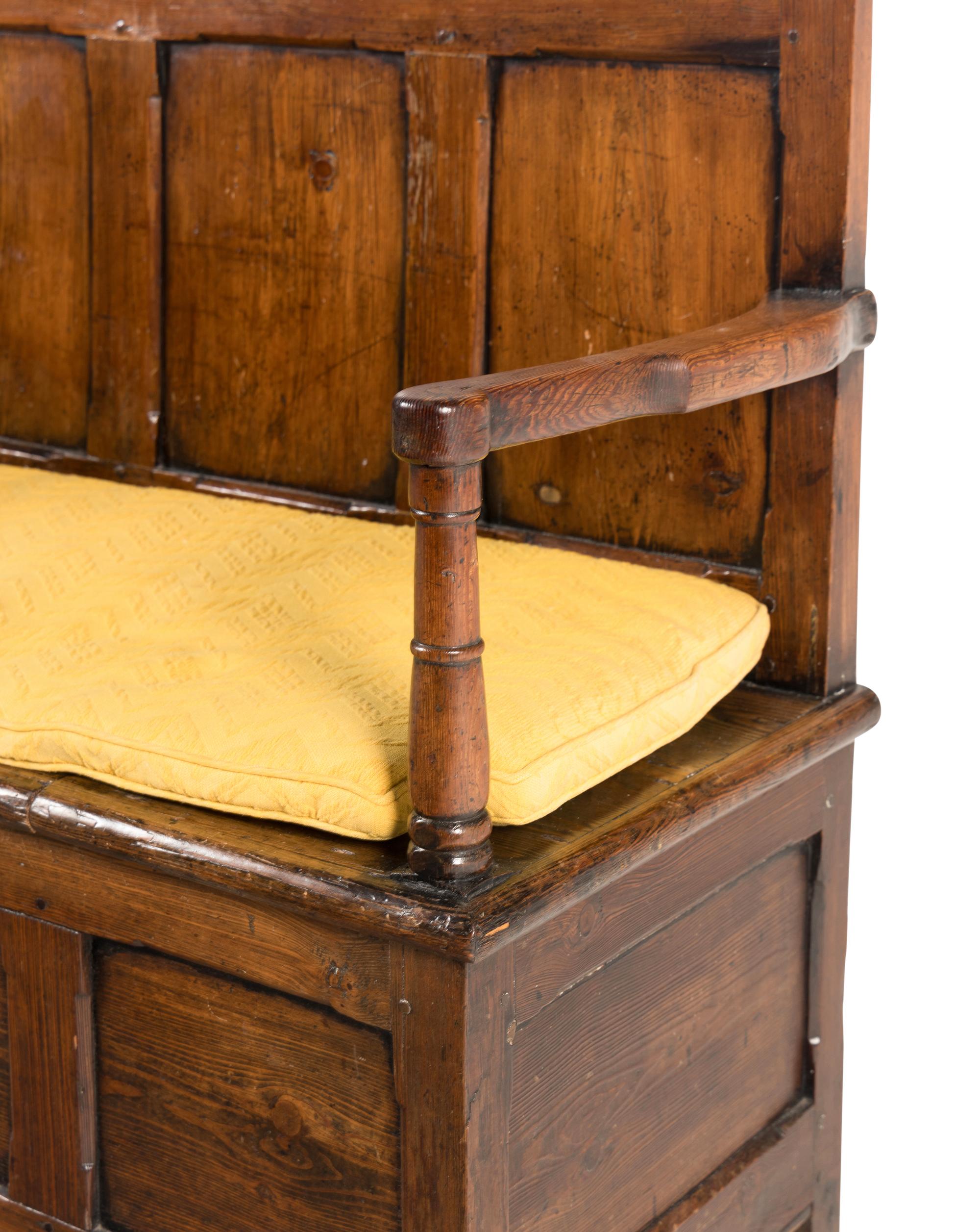 An English Carved Oak Settle