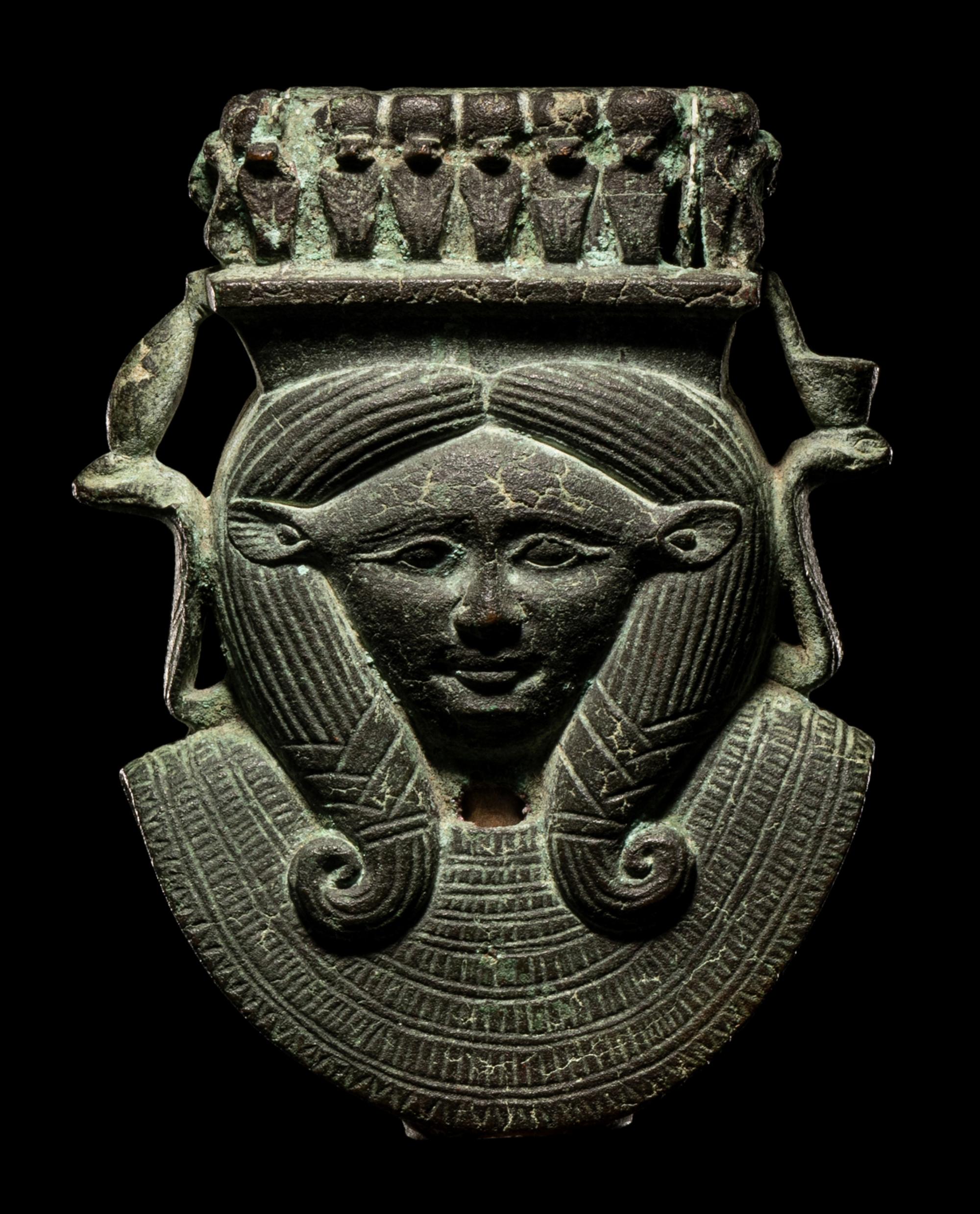 An Egyptian Bronze Hathor Sistrum Terminal