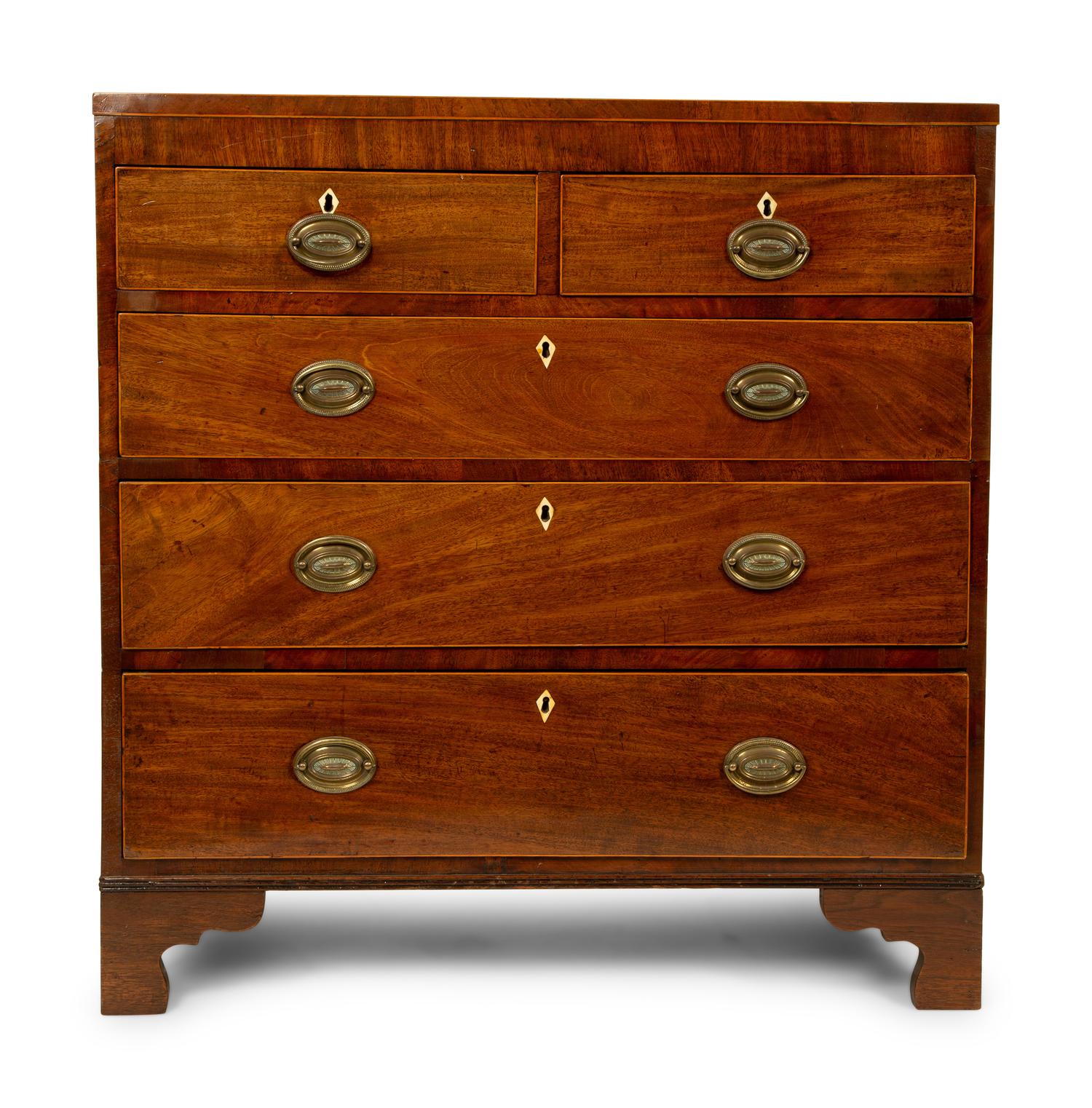 A Regency Style Walnut Chest of Drawers — 19TH CENTURY