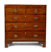 A Regency Style Walnut Chest of Drawers — 19TH CENTURY