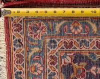 A Kashan Wool Rug