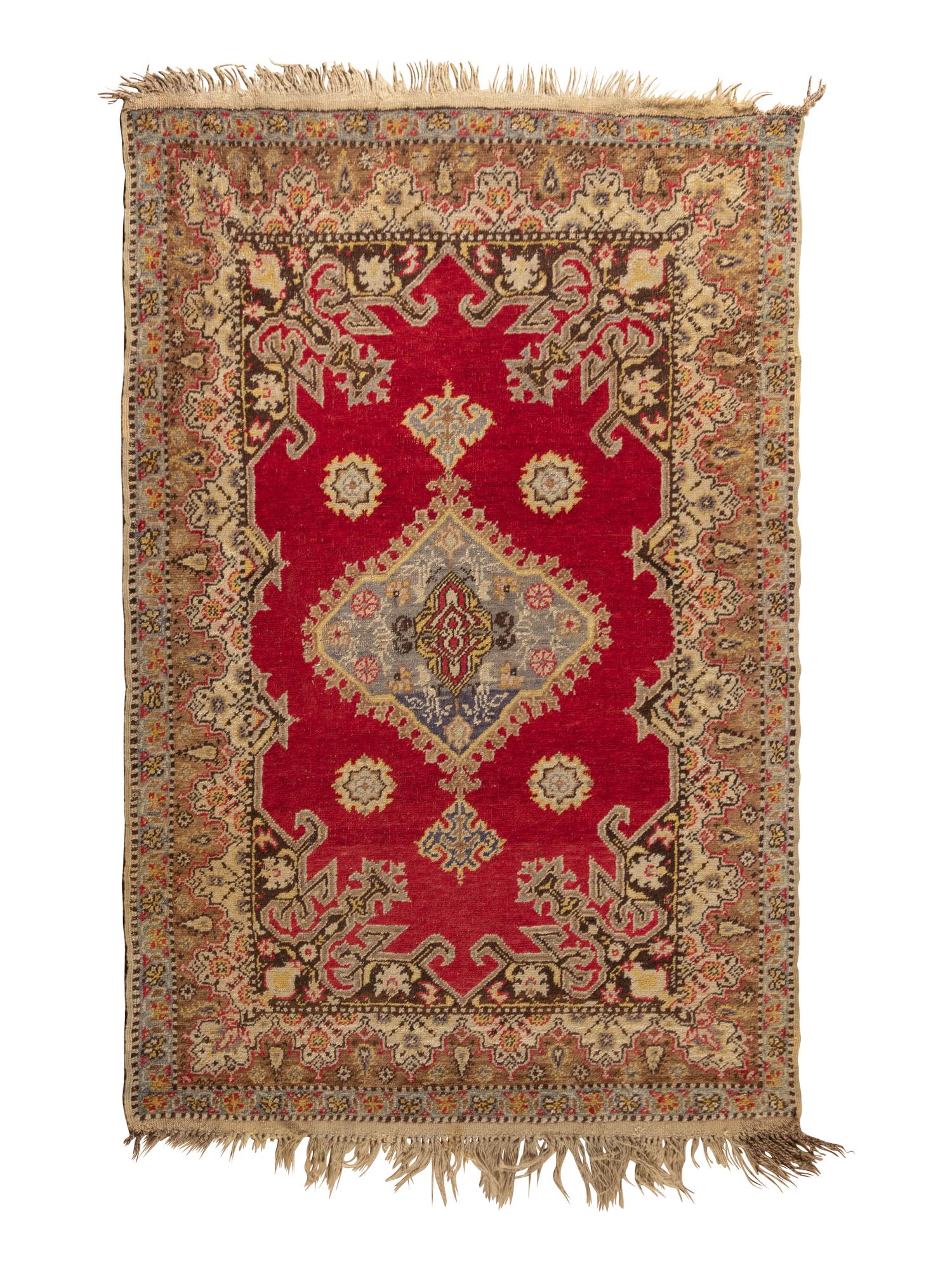 An Oushak Wool Rug