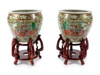 A Pair of Rose Medallion Porcelain Fish Bowls with Wood Stands