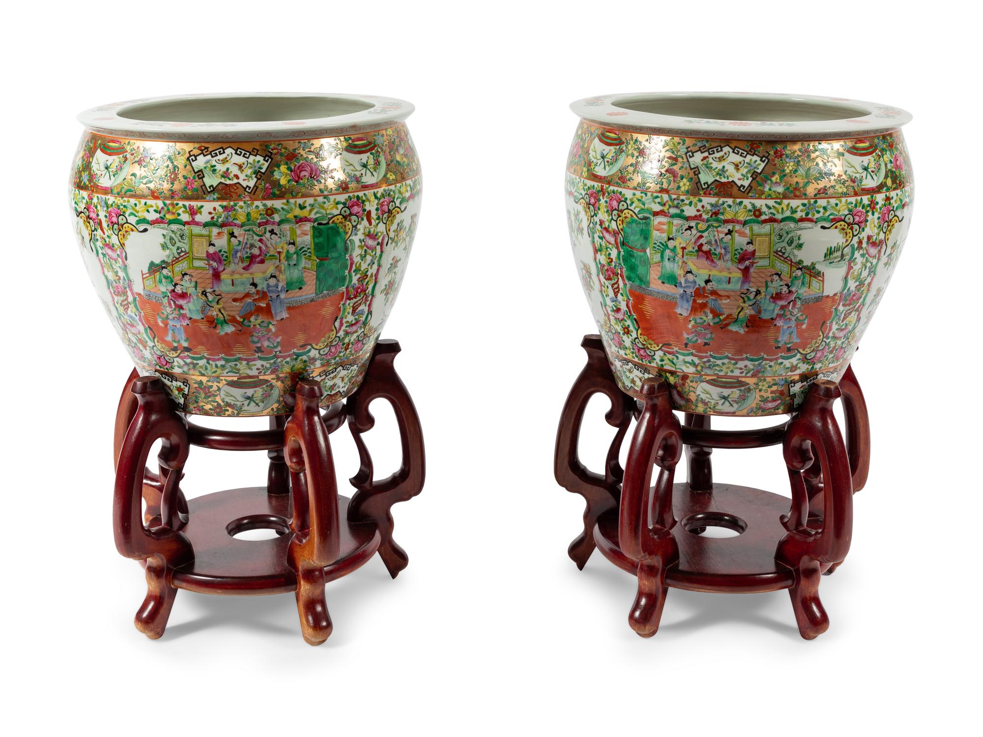 A Pair of Rose Medallion Porcelain Fish Bowls with Wood Stands