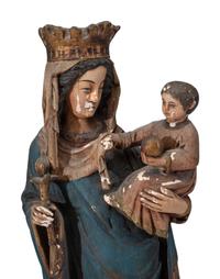 A Continental Paint Decorated Chalkware Santos Figure of the Madonna and Child