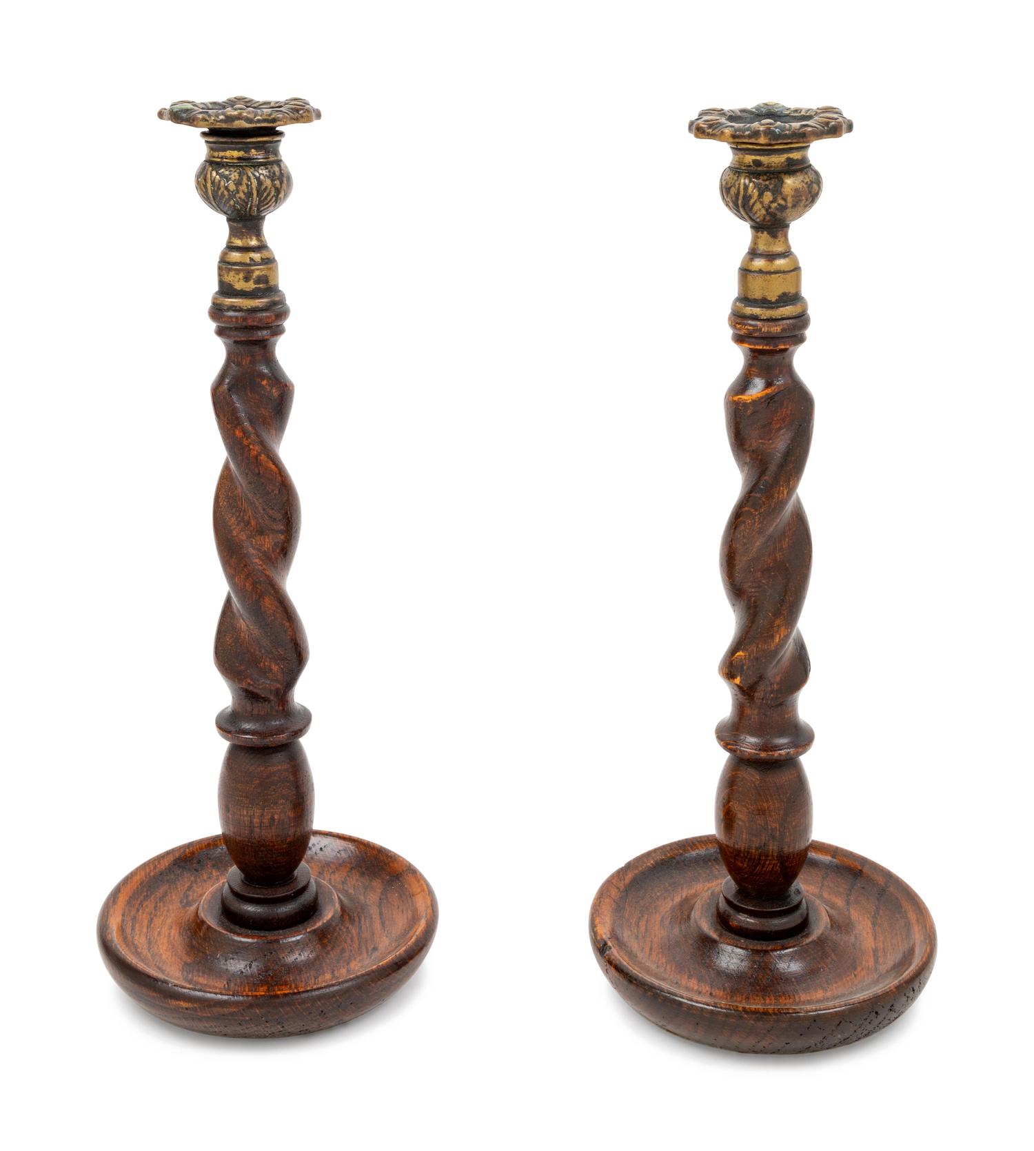 A Pair of English Brass Mounted Turned Oak Candlesticks