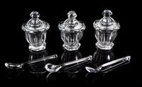 A Set of Three Baccarat Jelly Jars Height 4 1/2 inches.