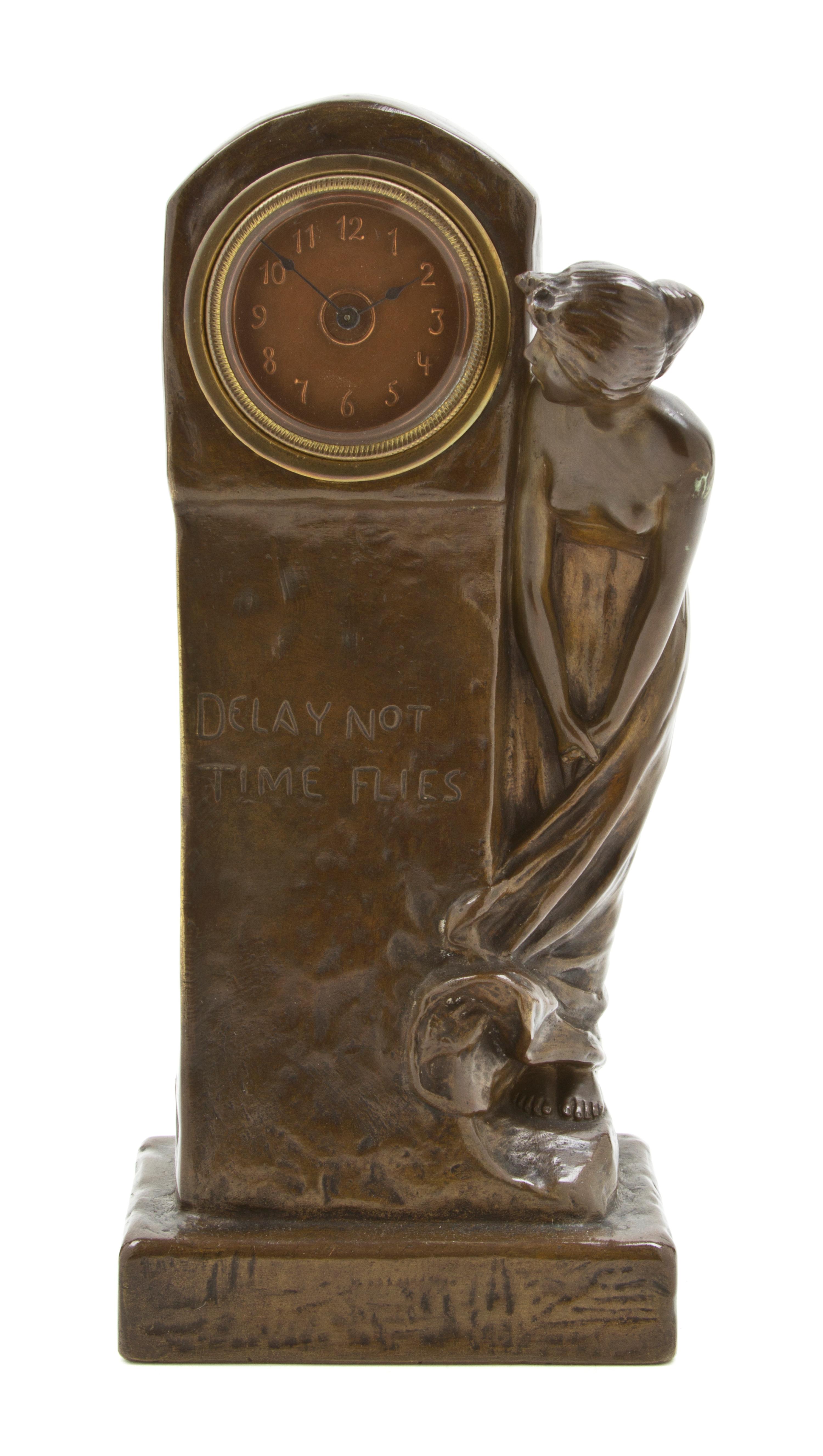 An Art Nouveau Bronze Figural Table Clock, Borsdorf, Height 9 3/4 inches.