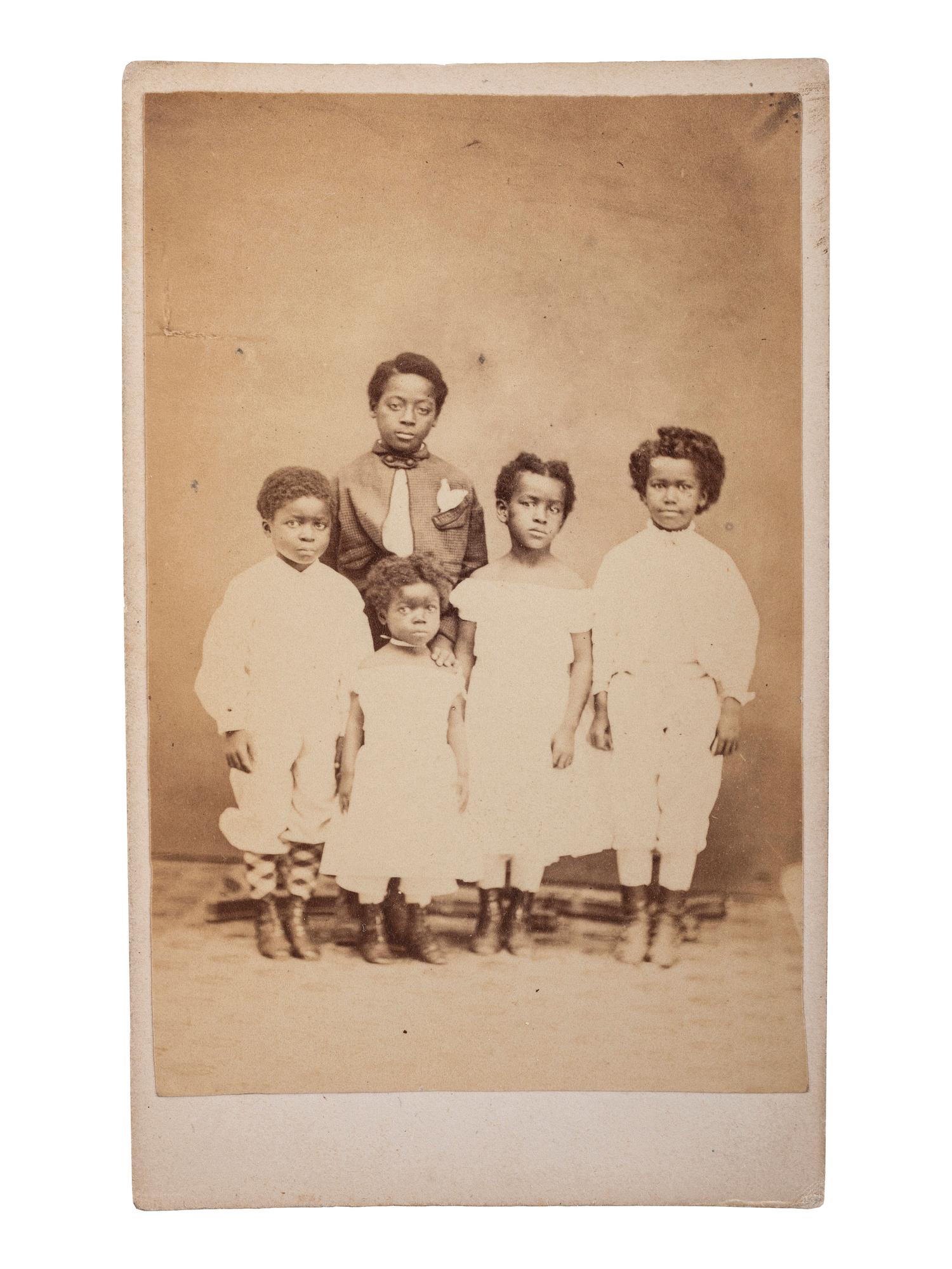 [SLAVERY & ABOLITION]. "Children of Slaves" Freedmen's School CDV and gem-sized tintype.