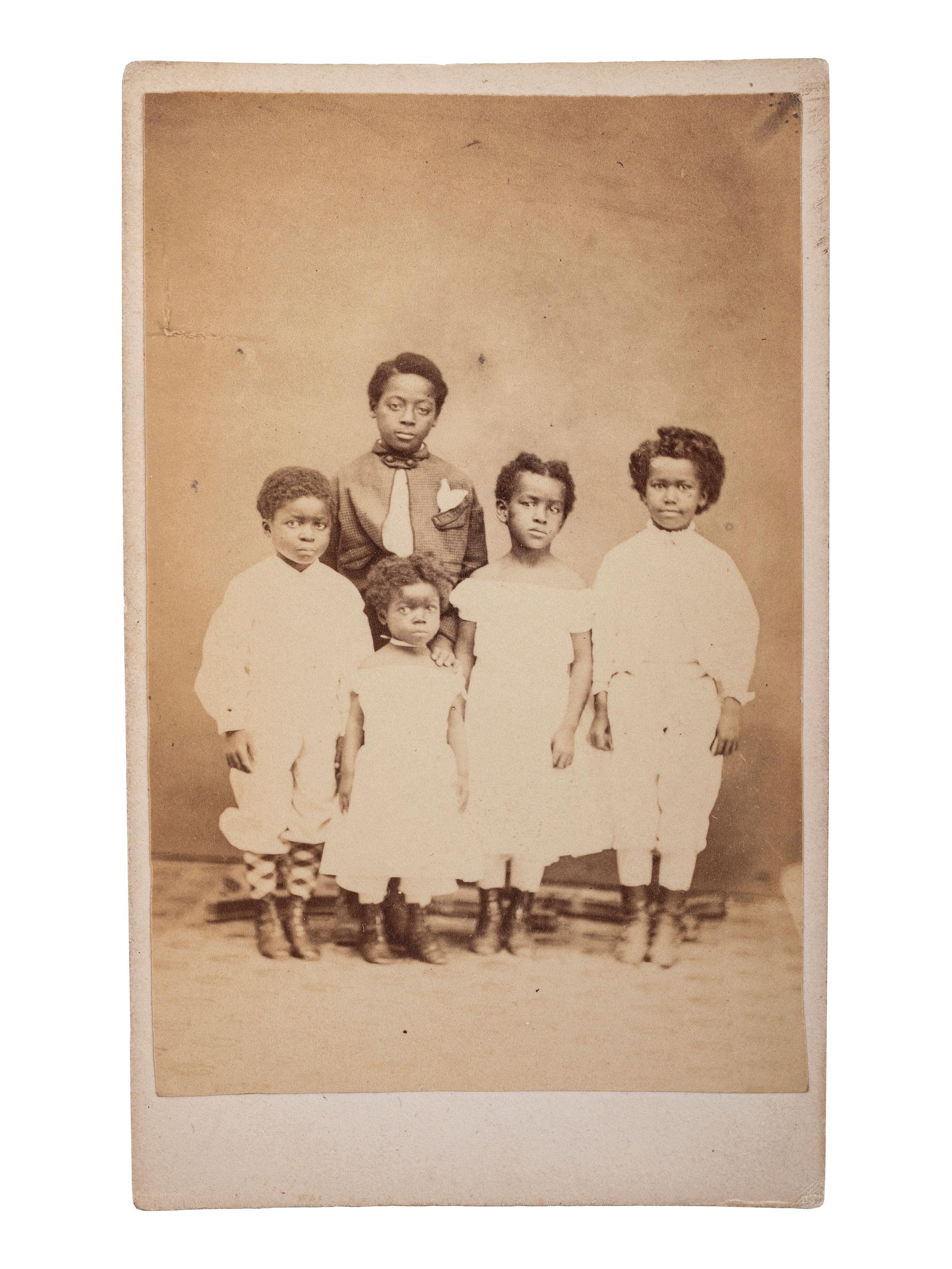 [SLAVERY & ABOLITION]. "Children of Slaves" Freedmen's School CDV and gem-sized tintype.