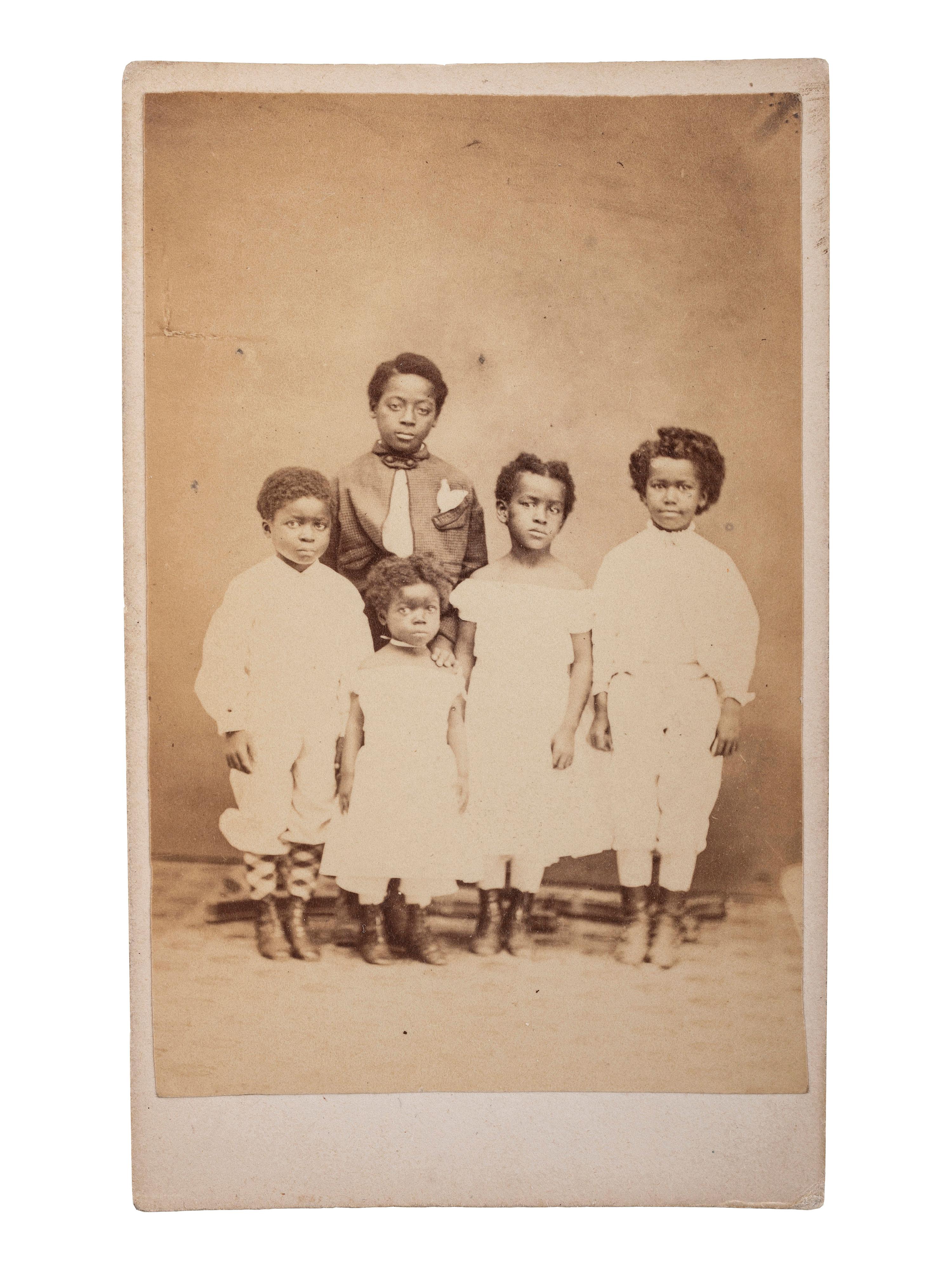 [SLAVERY & ABOLITION]. "Children of Slaves" Freedmen's School CDV and gem-sized tintype.