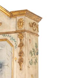 An Italian Polychrome and Cream-Painted and Parcel-Gilt Cabinet