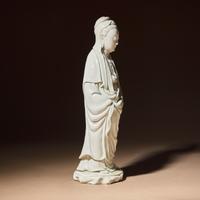 A Chinese Blanc-de-Chine Porcelain Standing Figure of Guanyin with 'He Chaozong' Mark, Qing Dynasty — 清 何朝宗款德化白瓷觀音立像