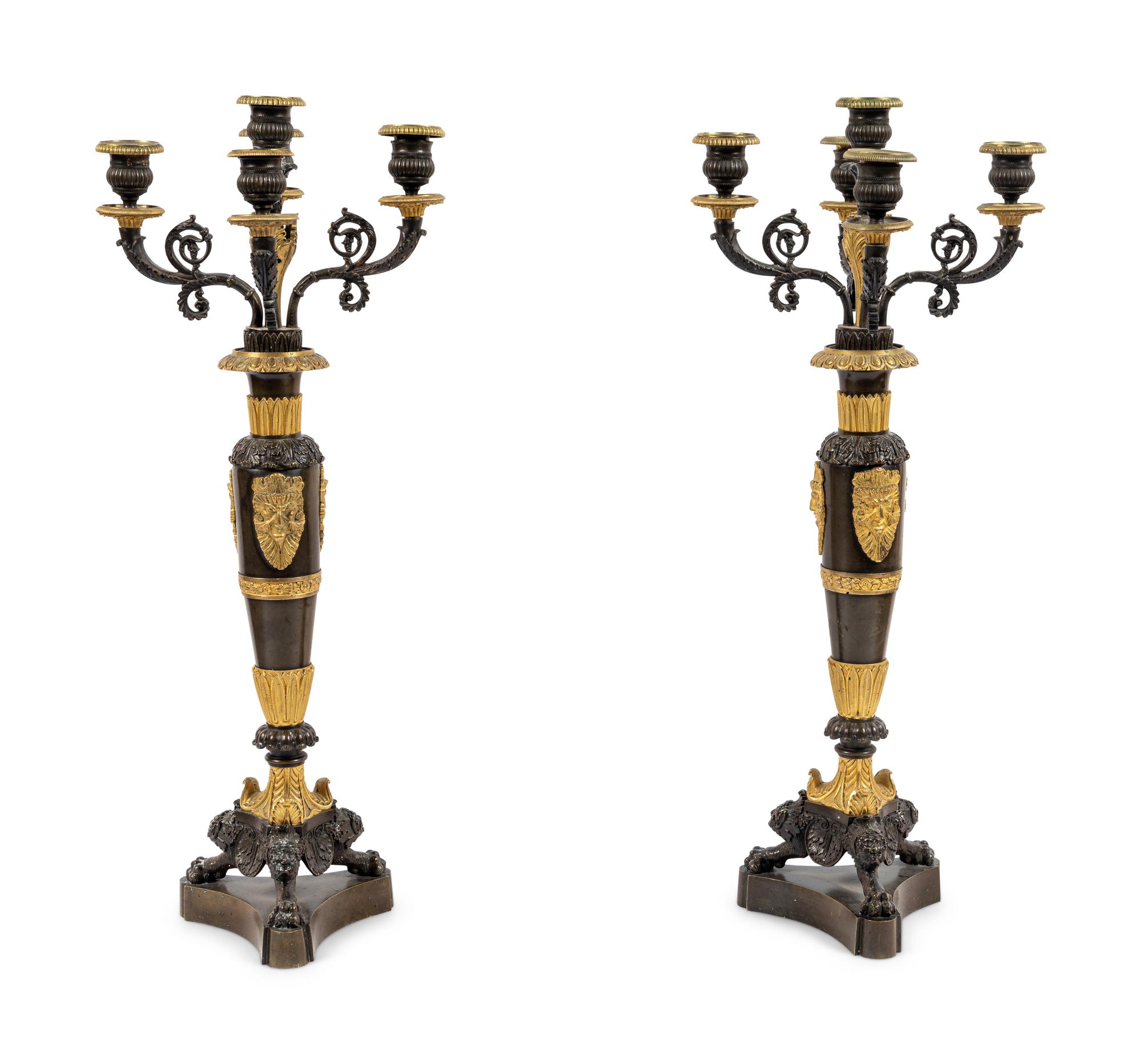A Pair of Louis Philippe Gilt and Patinated Bronze Five-Light Candelabra