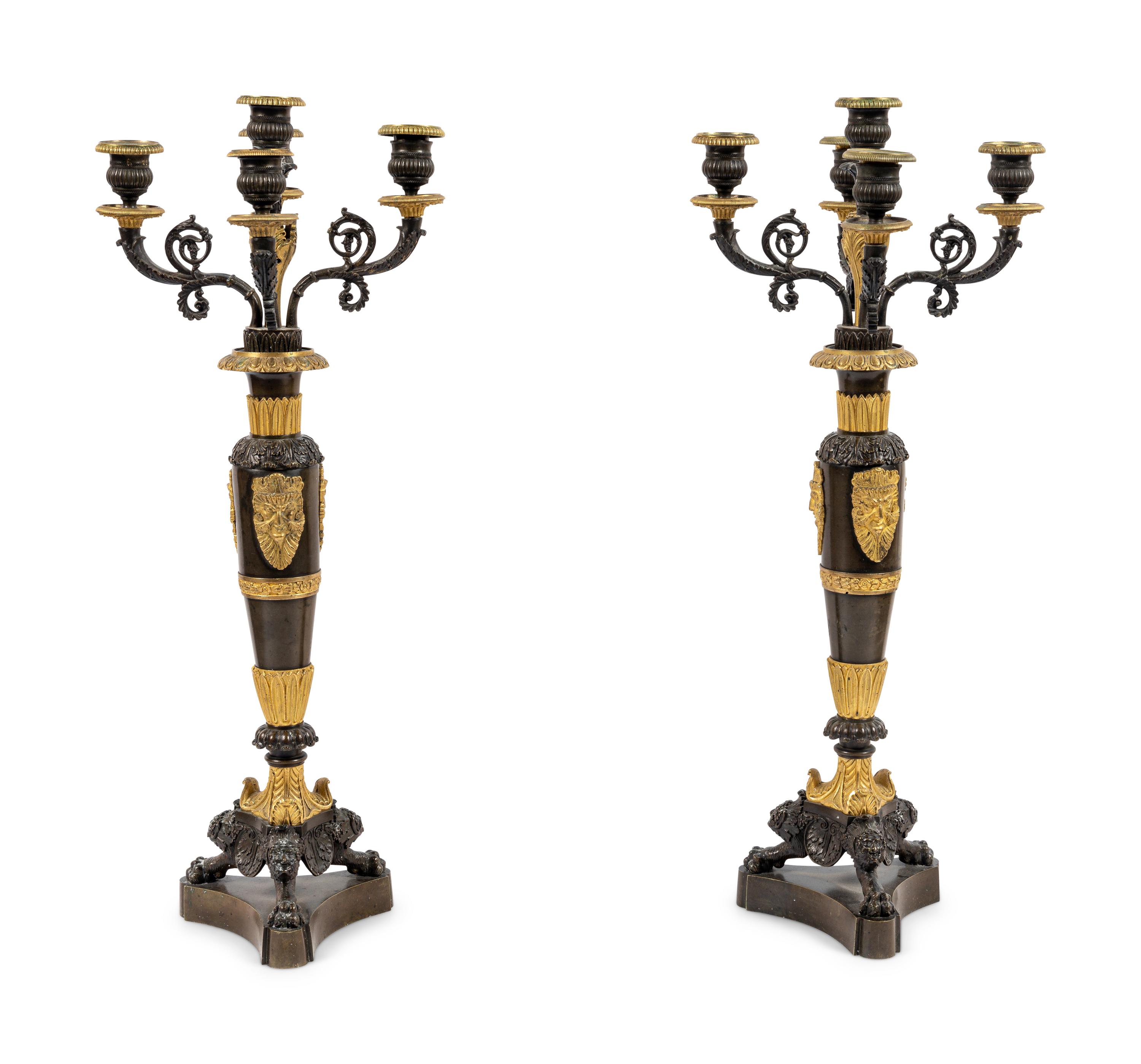 A Pair of Louis Philippe Gilt and Patinated Bronze Five-Light Candelabra