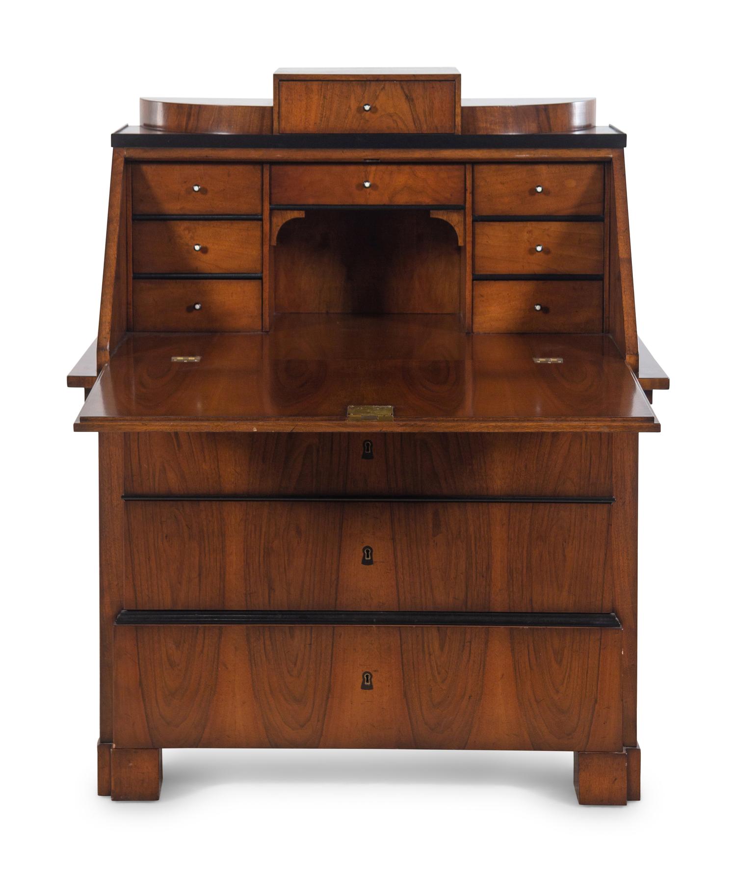 A Biedermeier Parcel Ebonized Birch Slant-Front Secretary