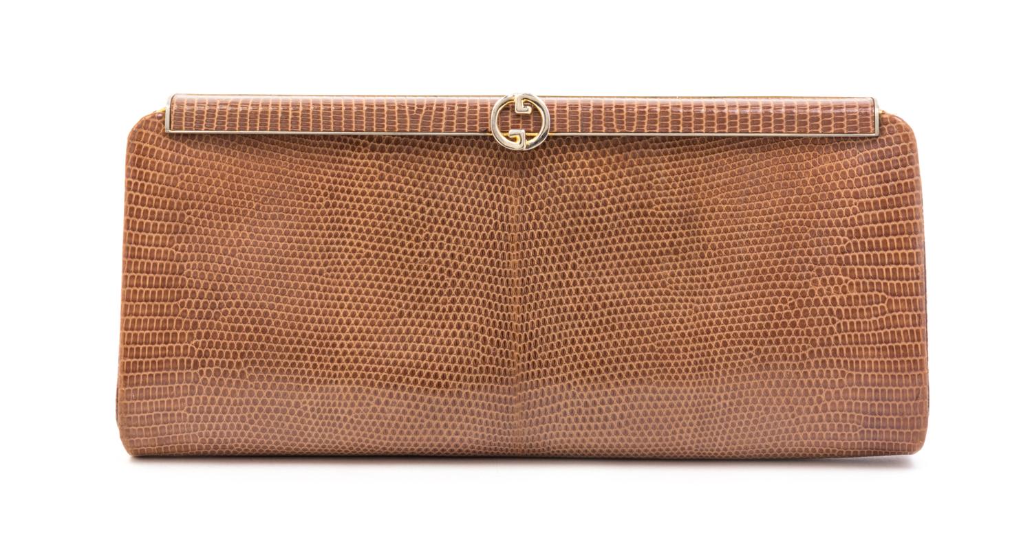 A Gucci Light Brown Reptile Skin Clutch, 10.5" x 5" x 1".