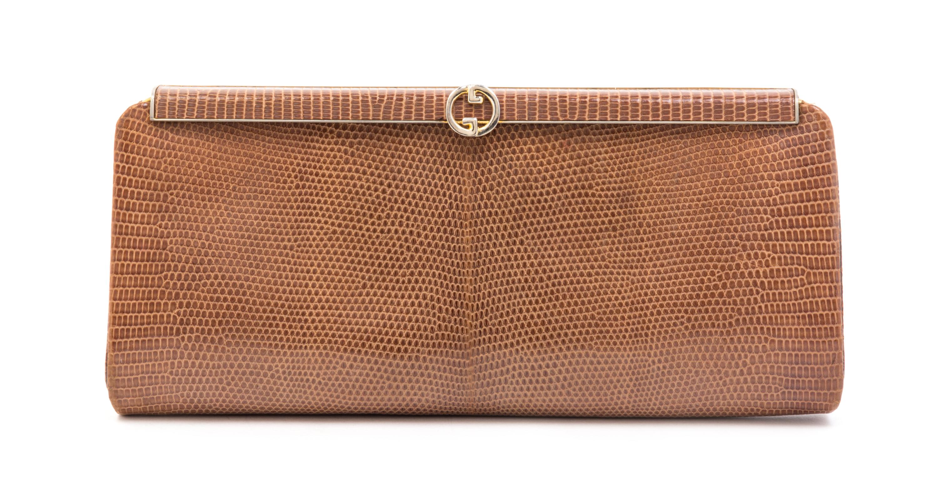 A Gucci Light Brown Reptile Skin Clutch, 10.5" x 5" x 1".