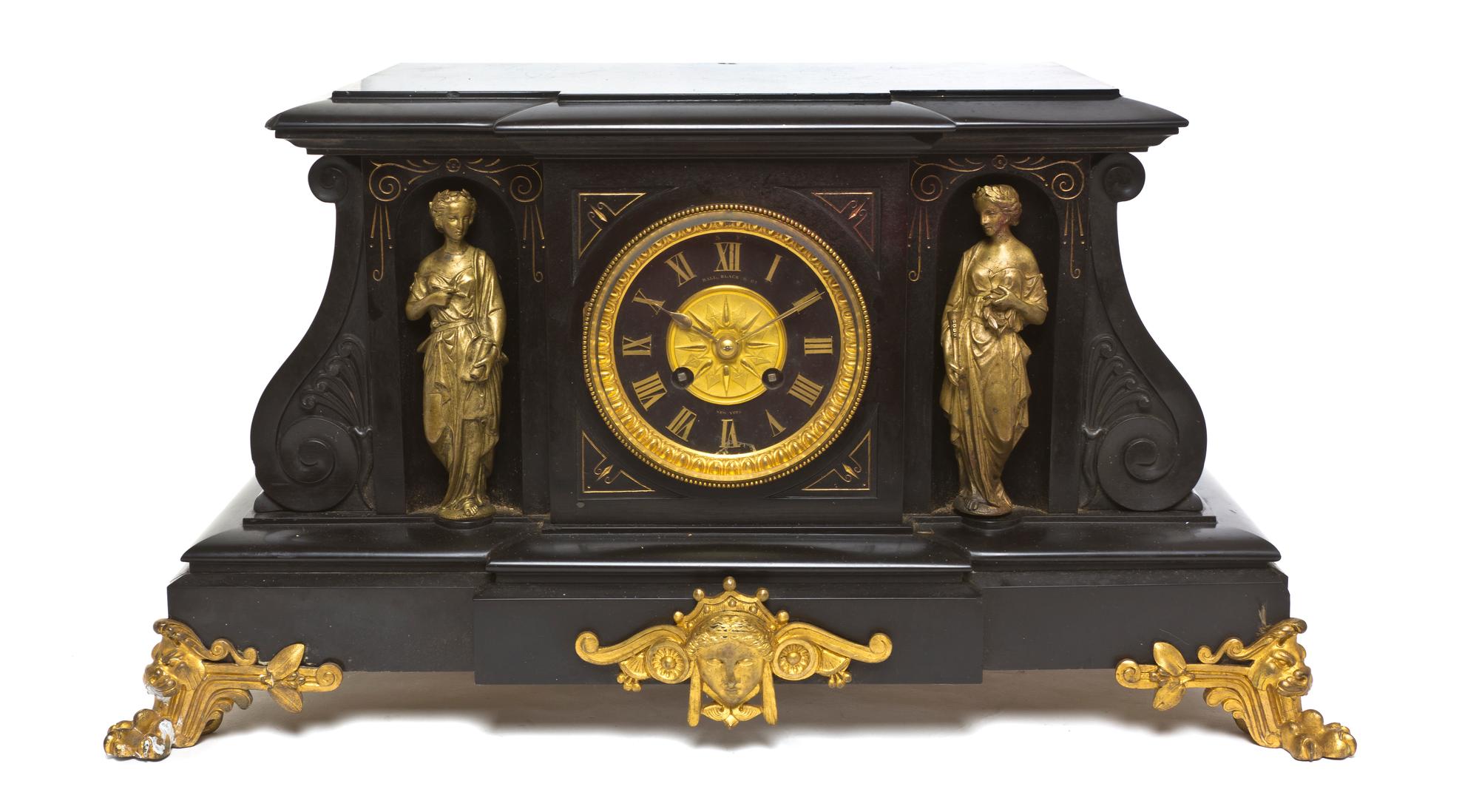A French Slate and Gilt Bronze Mantel Clock, Height 10 3/4 x width 20 5/8 x depth 10 1/2 inches.