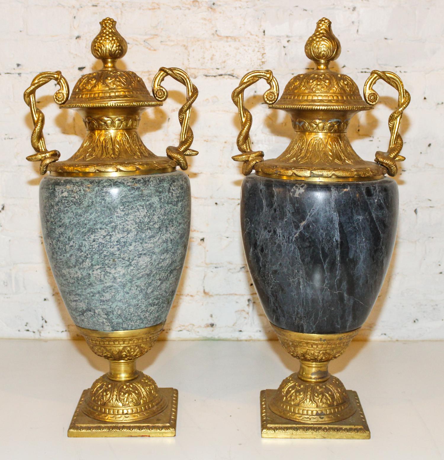 A Pair of Contemporary Gilt Metal Mounted Neoclassical Urns. Height 28 1/2 inches.