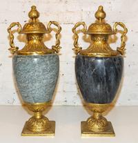 A Pair of Contemporary Gilt Metal Mounted Neoclassical Urns. Height 28 1/2 inches.