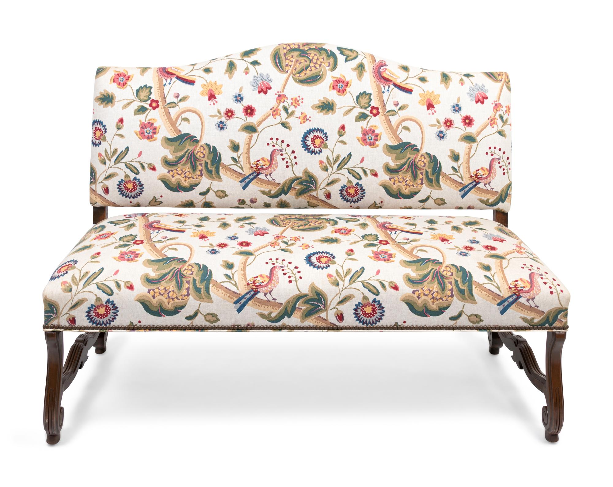 A Louis XIV Style Walnut Bench with Faux Crewelwork Upholstery