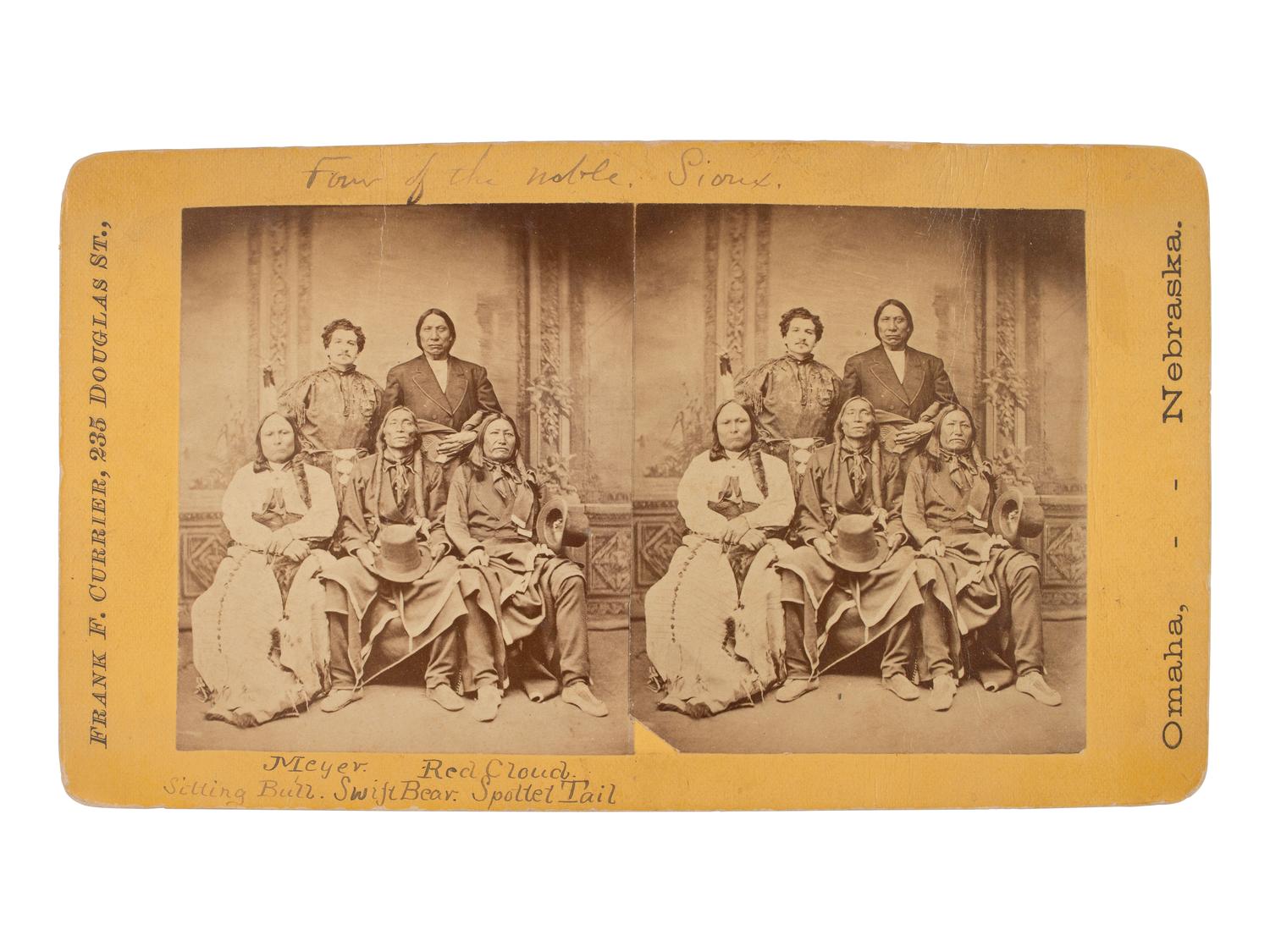CURRIER, Frank F. (1841-1887), photographer. Stereoview of Indian trader and Interpreter Julius Meyer and Sioux chiefs, incl. Red Cloud, Sitting Bull, Swift Bear, and Spotted Tail. Omaha, NE, 1875.