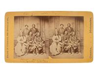 CURRIER, Frank F. (1841-1887), photographer. Stereoview of Indian trader and Interpreter Julius Meyer and Sioux chiefs, incl. Red Cloud, Sitting Bull, Swift Bear, and Spotted Tail. Omaha, NE, 1875.