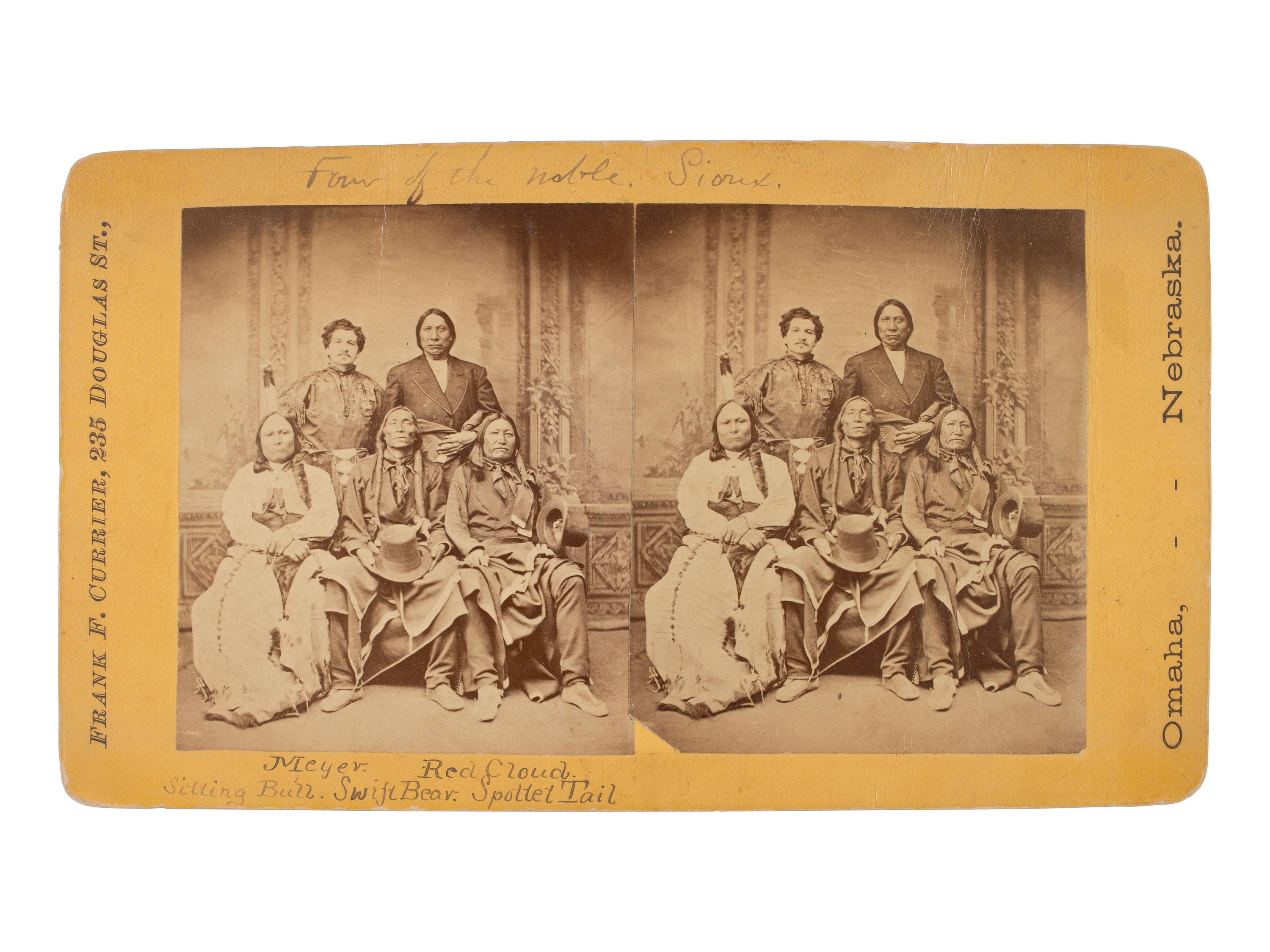 CURRIER, Frank F. (1841-1887), photographer. Stereoview of Indian trader and Interpreter Julius Meyer and Sioux chiefs, incl. Red Cloud, Sitting Bull, Swift Bear, and Spotted Tail. Omaha, NE, 1875.