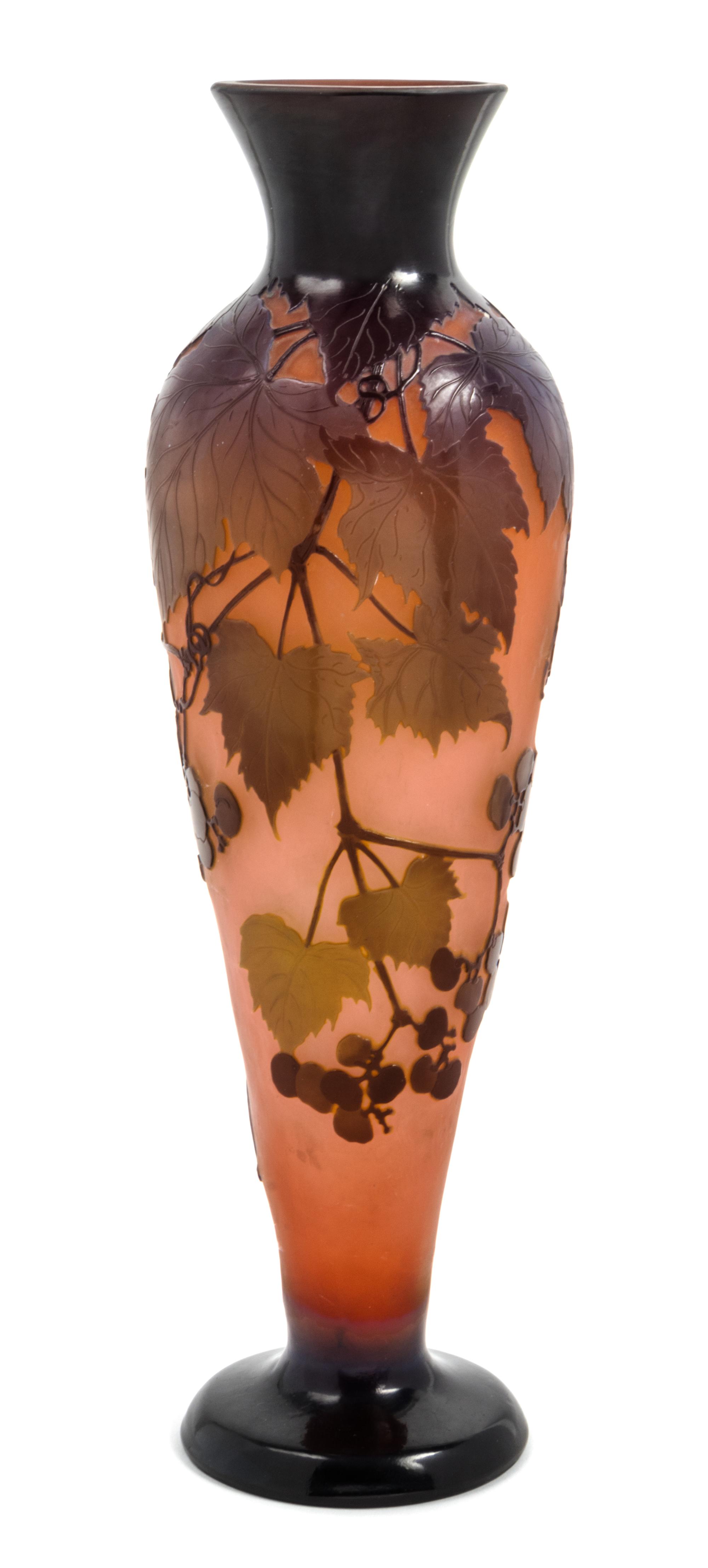 Emile Galle, (French, 1846-1904), a cameo glass vase, with berry laden leafy branch decoration