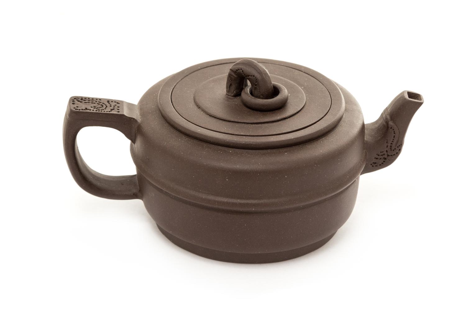 A Yixing Pottery Teapot Height 2 3/8 inches.
