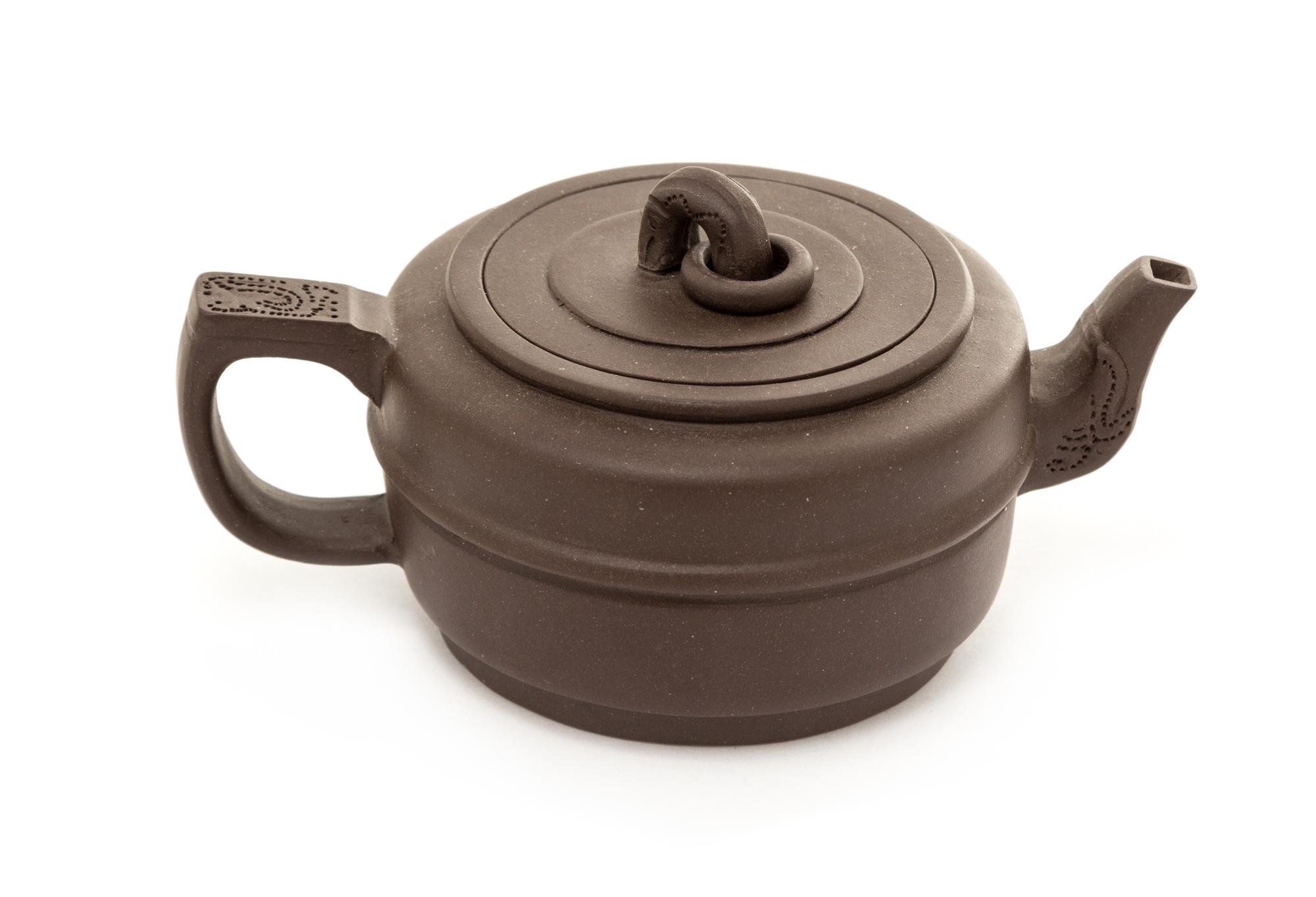 A Yixing Pottery Teapot Height 2 3/8 inches.