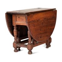 A Swedish Turned and Block Carved Pine Drop-Leaf Gate-Leg Dining Table