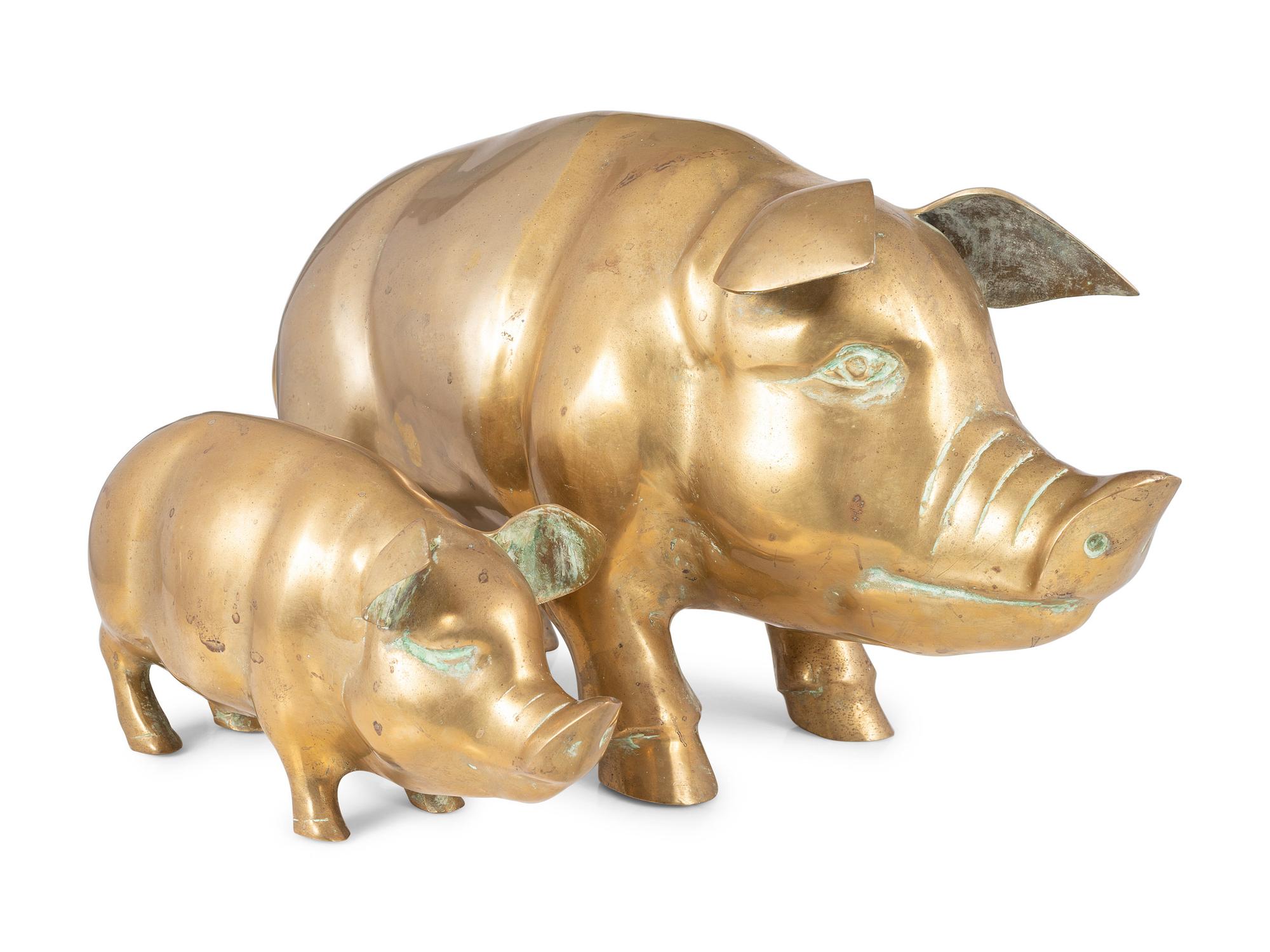 Two Brass Pig Sculptures