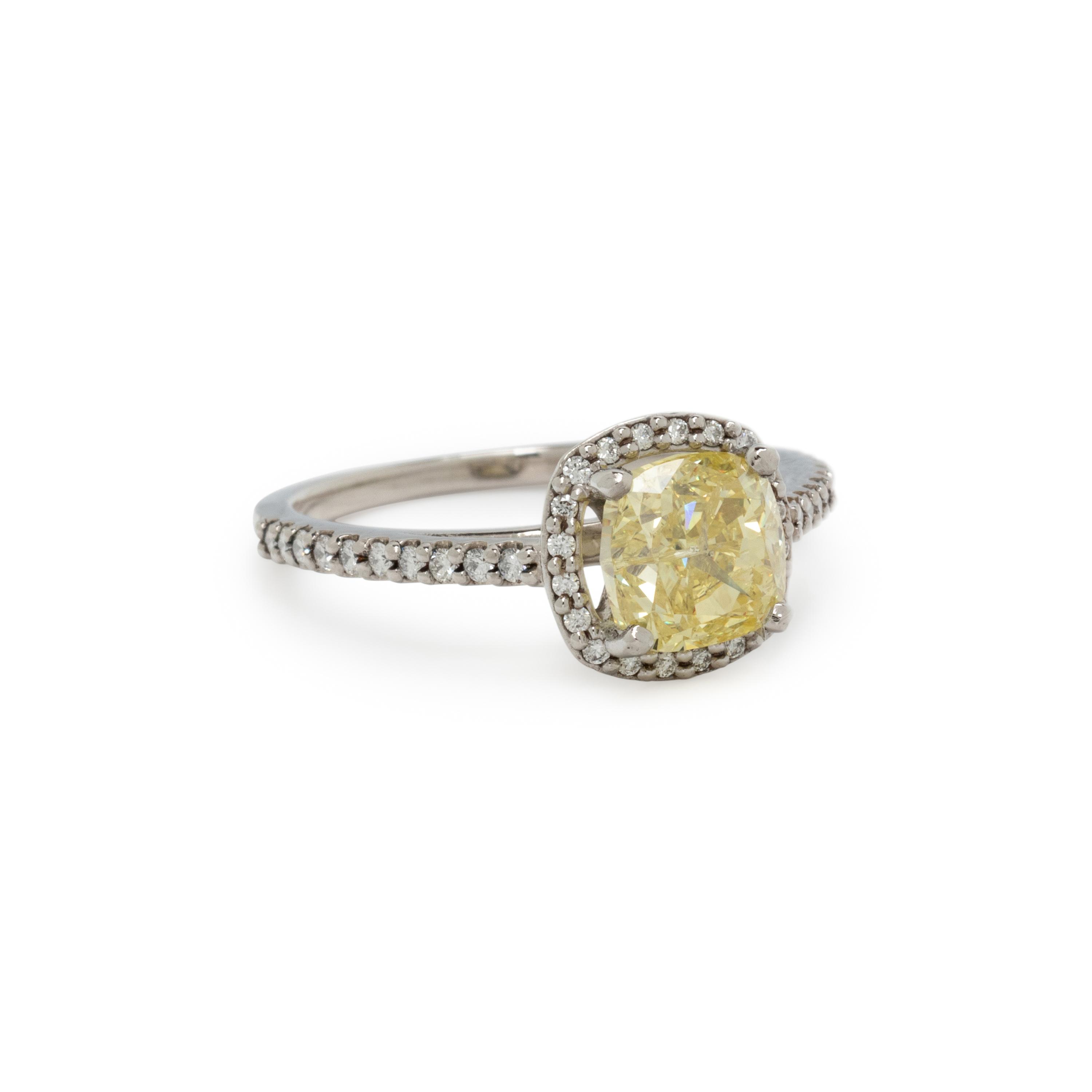 FANCY INTENSE YELLOW DIAMOND AND DIAMOND RING