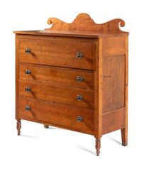 A Late Classical Carved Cherrywood Chest of Drawers
