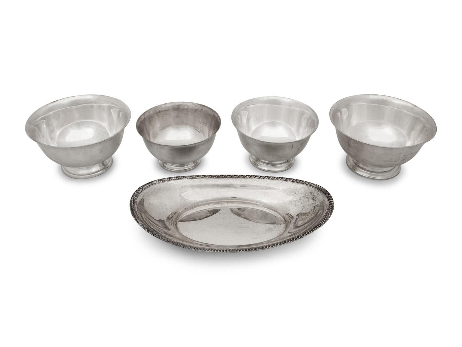 A Group of Four American Silver Revere Style Bowls and an Oval Dish