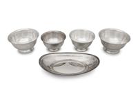 A Group of Four American Silver Revere Style Bowls and an Oval Dish