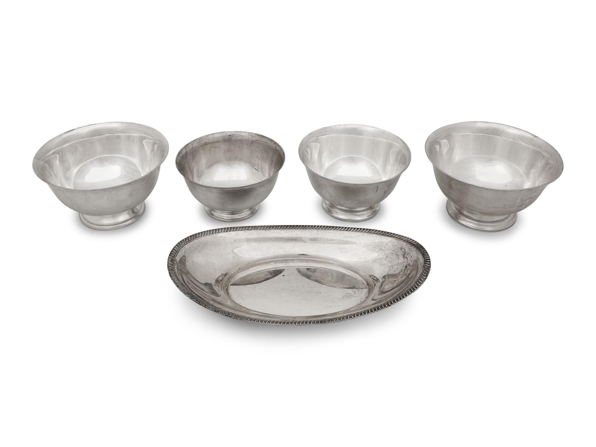 A Group of Four American Silver Revere Style Bowls and an Oval Dish