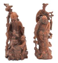Two Chinese Carved Wood Figures of Shoulao Height of first 13 1/2 inches. — 20TH CENTURY