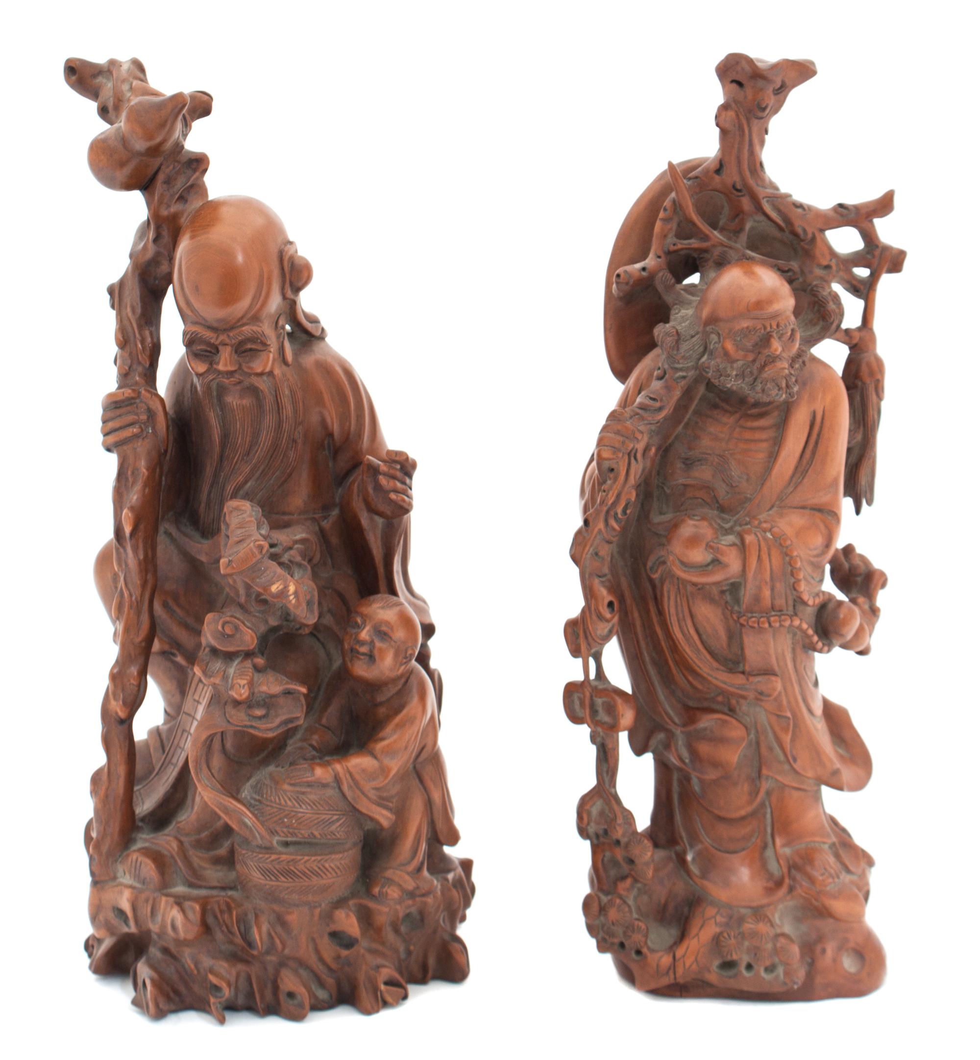 Two Chinese Carved Wood Figures of Shoulao Height of first 13 1/2 inches. — 20TH CENTURY